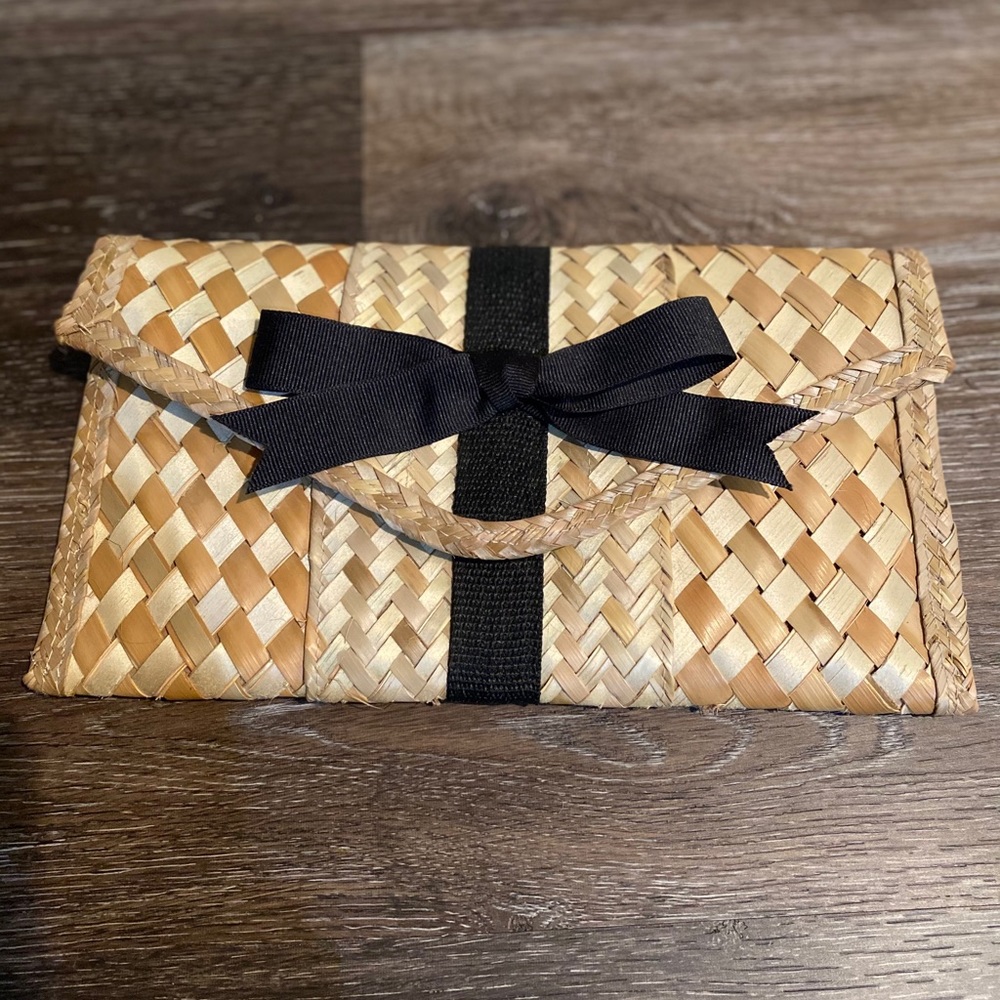hand woven clutch with black grosgrain bow
